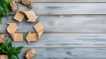 Recycle symbol on wooden background photo