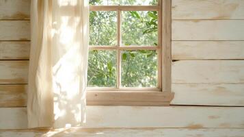 A window with a curtain hanging from it photo