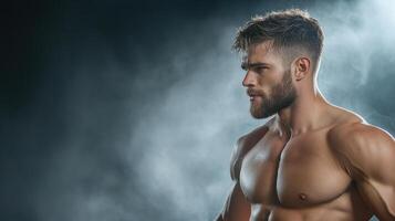 A man with no shirt on standing in front of a smokey background photo