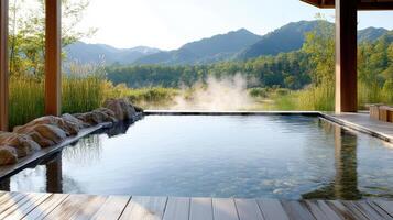 A hot tub in front of a mountain range photo