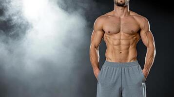 A man with no shirt on standing in front of a smoke cloud photo