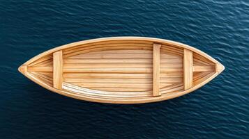Classic wooden boat floating on deep navy water, showcasing craftsmanship photo