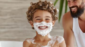 boy happily playing with shaving foam, enjoying fun moment with his father photo