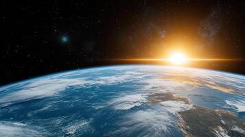 stunning view of Earth from space with sunrise illuminating horizon photo
