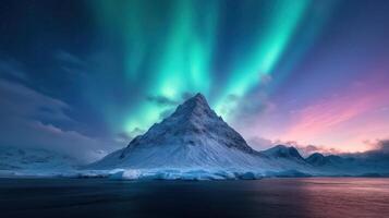 breathtaking view of Northern Lights illuminating snowy mountain peak at dusk photo