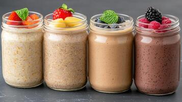 Creamy smoothies in jars topped with fresh fruits and mint leaves create vibrant breakfast photo