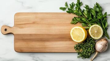 Fresh herbs and citrus fruits on wooden cutting board create vibrant kitchen scene photo