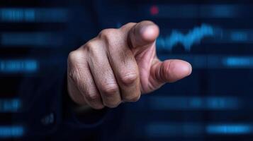 hand pointing towards digital interface with data visualizations, symbolizing analytics and photo