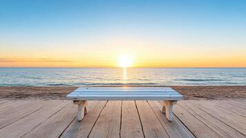 serene wooden bench overlooks tranquil beach at sunset, creating peaceful atmosphere photo
