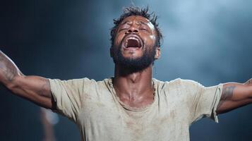 Passionate performer expressing deep emotions on stage, captivating audience with intensity photo