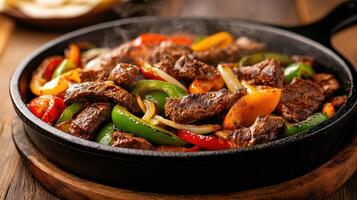 Sizzling steak with colorful peppers and onions cast iron skillet creates mouthwatering scene photo