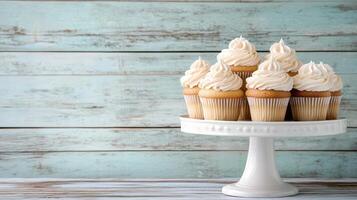 Delicious vanilla cupcakes on vintage stand, perfect for any celebration photo