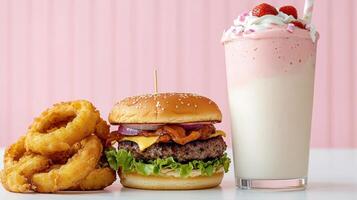 delicious vintage diner meal featuring classic burger, onion rings, and milkshake, evoking photo