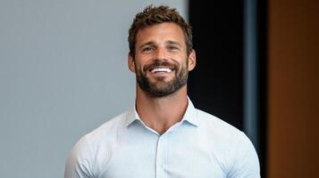 Smiling man in light shirt, showcasing confidence and professionalism in modern setting photo