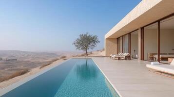 luxurious desert resort featuring stunning infinity pool and serene landscape views photo