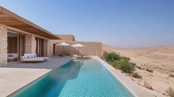 Luxurious desert resort featuring stunning pool and serene landscape. Relaxation and tranquility photo