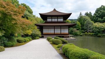 serene temple surrounded by lush greenery and tranquil pond, inviting peace and reflection photo