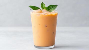 Creamy iced tea with coconut milk and fresh basil leaves, perfect for refreshing drink photo