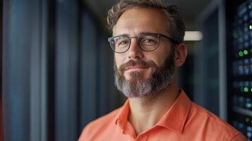 confident man with glasses and beard stands in modern data center, showcasing expertise photo