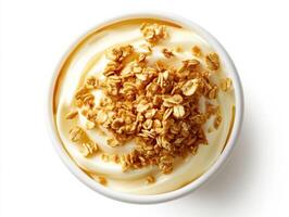 Delicious yogurt topped with crunchy granola and honey drizzle photo