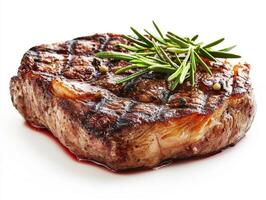 Grilled steak garnished with fresh rosemary on a white background photo