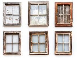 Vintage wooden windows arranged on a rustic wall photo