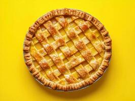 Freshly baked pie with a golden lattice crust on a bright background photo