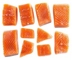 Fresh salmon fillets on a white background ready for cooking photo