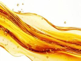 Golden liquid flows smoothly creating abstract shapes and bubbles photo