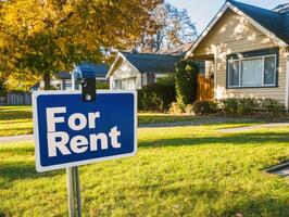 House for rent in a peaceful neighborhood surrounded by trees photo