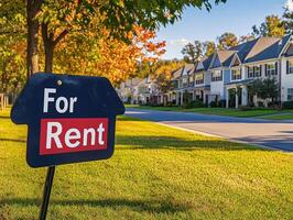 Houses available for rent on a sunny day in a suburban neighborhood photo