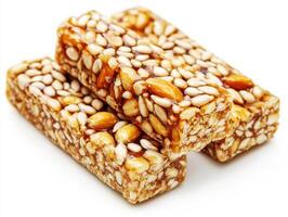 Healthy snack bars made with nuts and sesame seeds photo