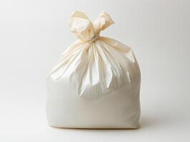 Garbage bag filled with waste on a clean surface photo
