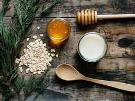 Ingredients for a healthy breakfast with oats, honey, and milk photo