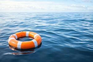 Lifebuoy floating in calm ocean waters under a clear sky photo