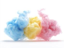 Colorful smoke clouds create a vibrant display or cotton candy on a white background photo