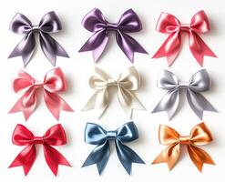 Colorful satin bows arranged in a grid pattern on a white background photo