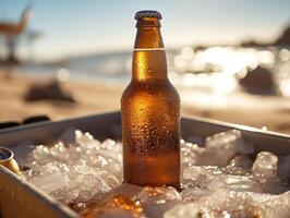 Cool beverage bottle resting on ice by the beach at sunset photo