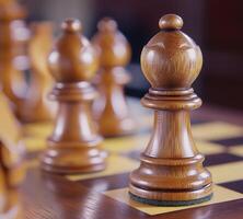 Close-up of a wooden chess piece on a vintage chessboard photo