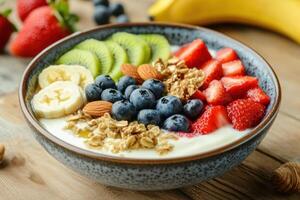 Delicious bowl of yogurt with fresh fruits and granola photo