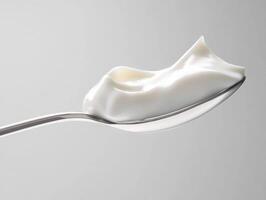 Creamy texture on spoon shows fresh ingredient ready for use photo