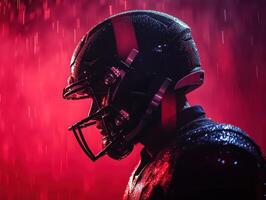 Intense football player prepares in the rain during night game photo