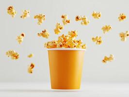 Popcorn soaring from a bright cup against a neutral backdrop photo