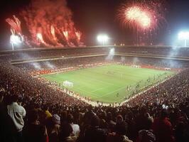 Exciting soccer match under fireworks at a packed stadium photo