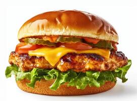 Juicy grilled chicken burger with fresh toppings and bun photo
