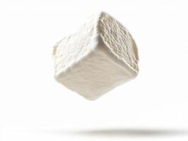Floating marshmallow cube against a white background photo