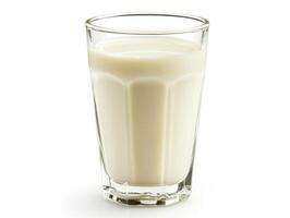 Glass of fresh milk on a plain background photo