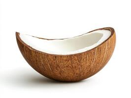 Coconut shell half resting on a plain background with inner texture photo