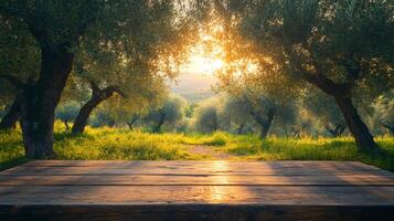 Empty wooden table presenting scenic olive grove at sunset photo