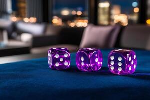 Purple dice showing different numbers on blue table in blurred luxurious room photo